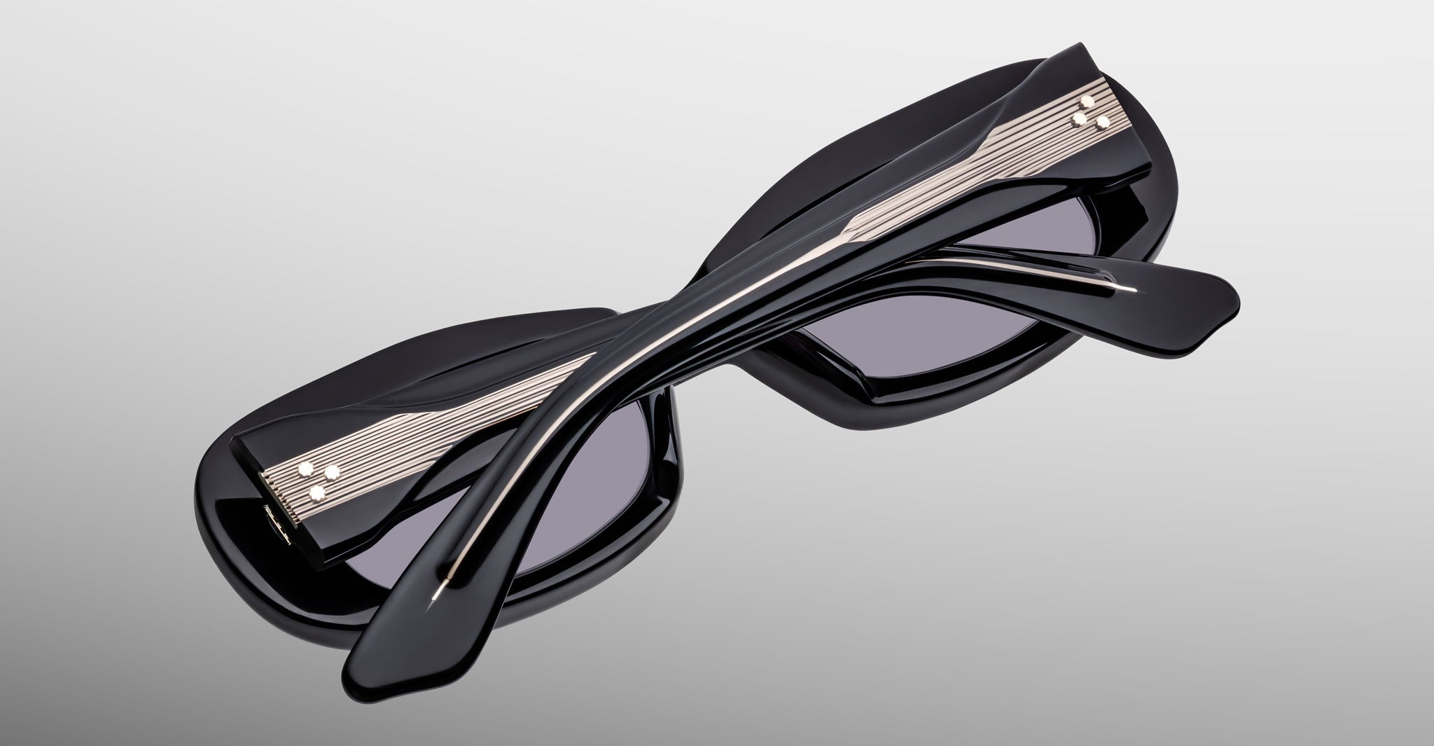 Jacques Marie Mage Ann in Raven black, top-down view showing crossed temples and engraved wirecore detail