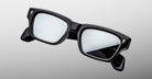 Jacques Marie Mage Ashcroft in Black Mirror acetate with a bold rectangular silhouette, sculpted temples, signature arrowhead front pins, and grey tinted mirrored lenses