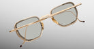 Jacques Marie Mage Atkins gold square eyeglasses with gray lenses, back view.