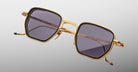 Jacques Marie Mage Atkins gold square sunglasses with UV-protection tinted lenses, front view.