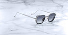 Jacques Marie Mage Atkins square-lens aviator sunglasses with thin metal arms, top view.