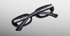 Jacques Marie Mage Besset black sunglasses with crossed temples, product side view.