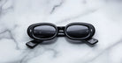 Jacques Marie Mage Besset in Shadow oval black acetate sunglasses