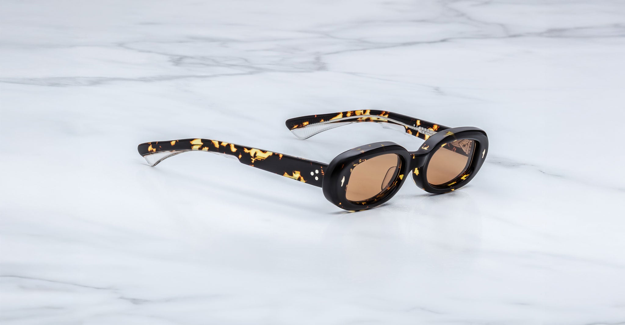 Jacques Marie Mage Besset sunglasses in brown and yellow tortoise shell pattern with orange lenses 3-4 view