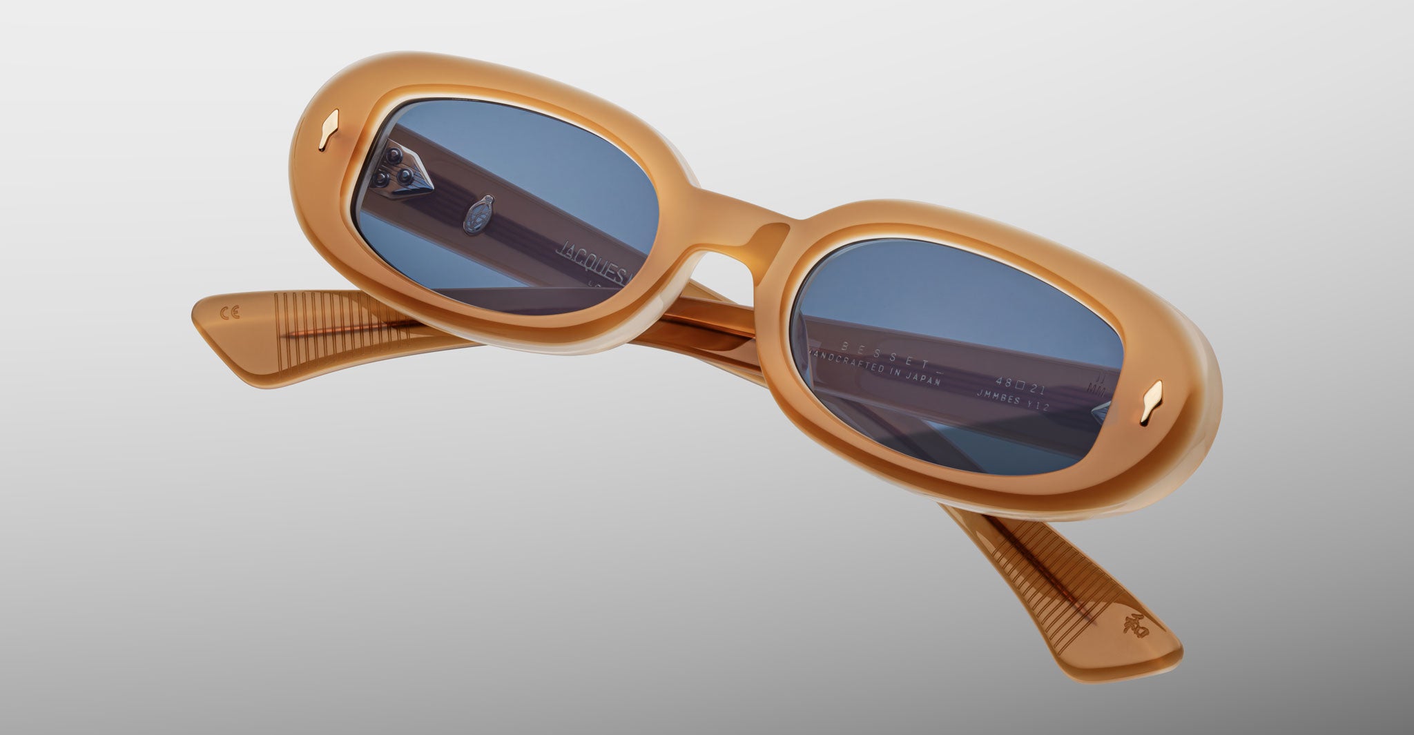 Jacques Marie Mage Besset sunglasses in tan with blue lenses close-up front view