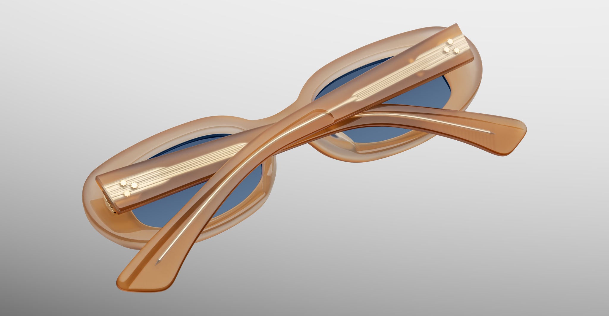 Jacques Marie Mage Besset sunglasses in tan with blue lenses close-up back view, showing gold inner hardware in the temples