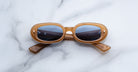 Jacques Marie Mage Besset sunglasses in tan with blue lenses front view