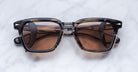 Jacques Marie Mage Borodino tortoiseshell sunglasses with brown lenses, shown from above.