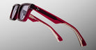A side view of Jacques Marie Mage Casablanca eyeglasses features red rectangular transparent frames with tinted lenses against a light gray background.