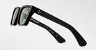 Jacques Marie Mage Quentin black rectangular sunglasses with thick frames, side view.