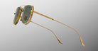 Jacques Marie Mage Cendrars gold aviator sunglasses with green lenses, front view.