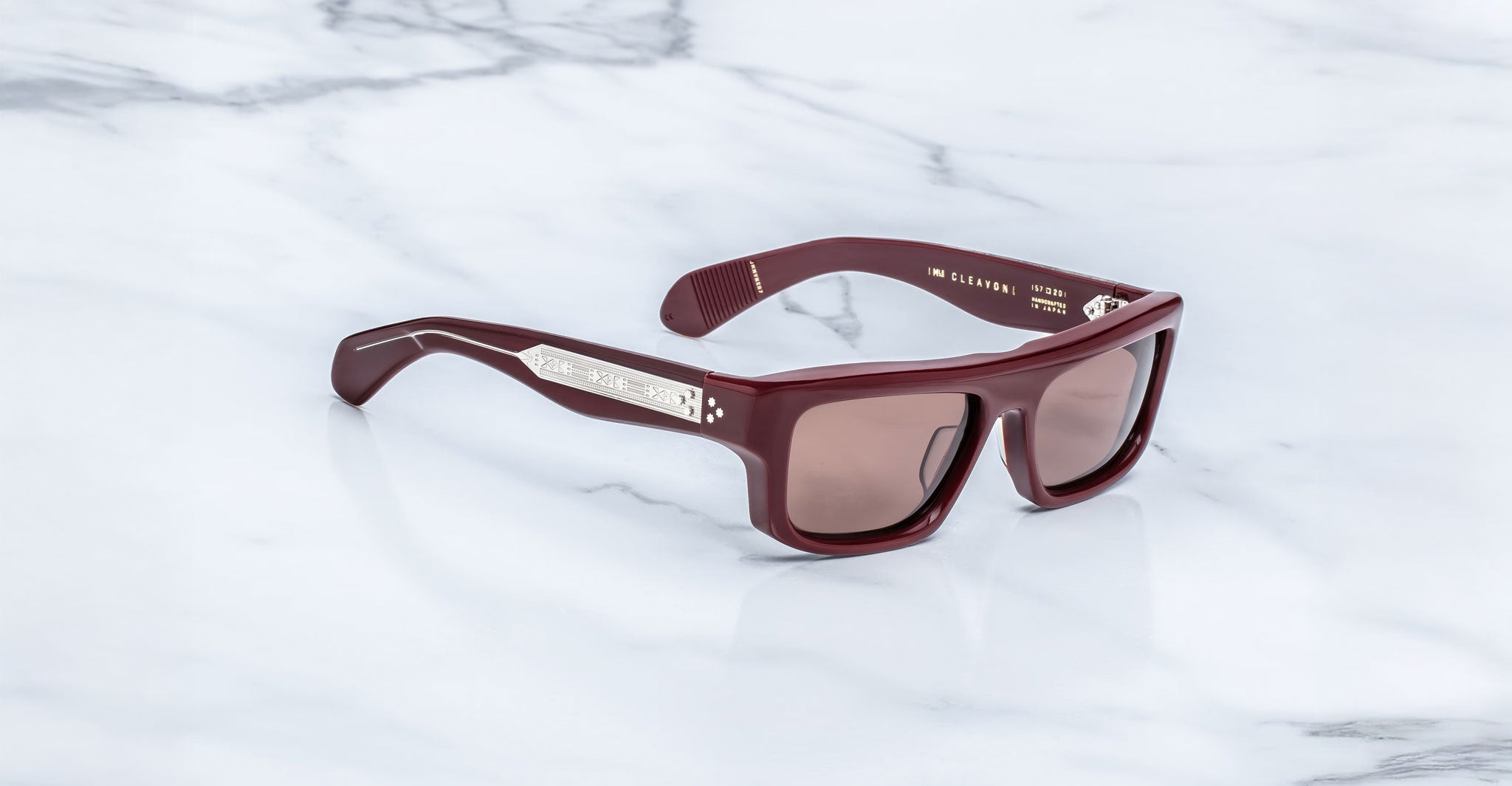 Jacques Marie Mage Cleavon 57 maroon rectangular sunglasses with thick frames and brown UV lenses, front view.