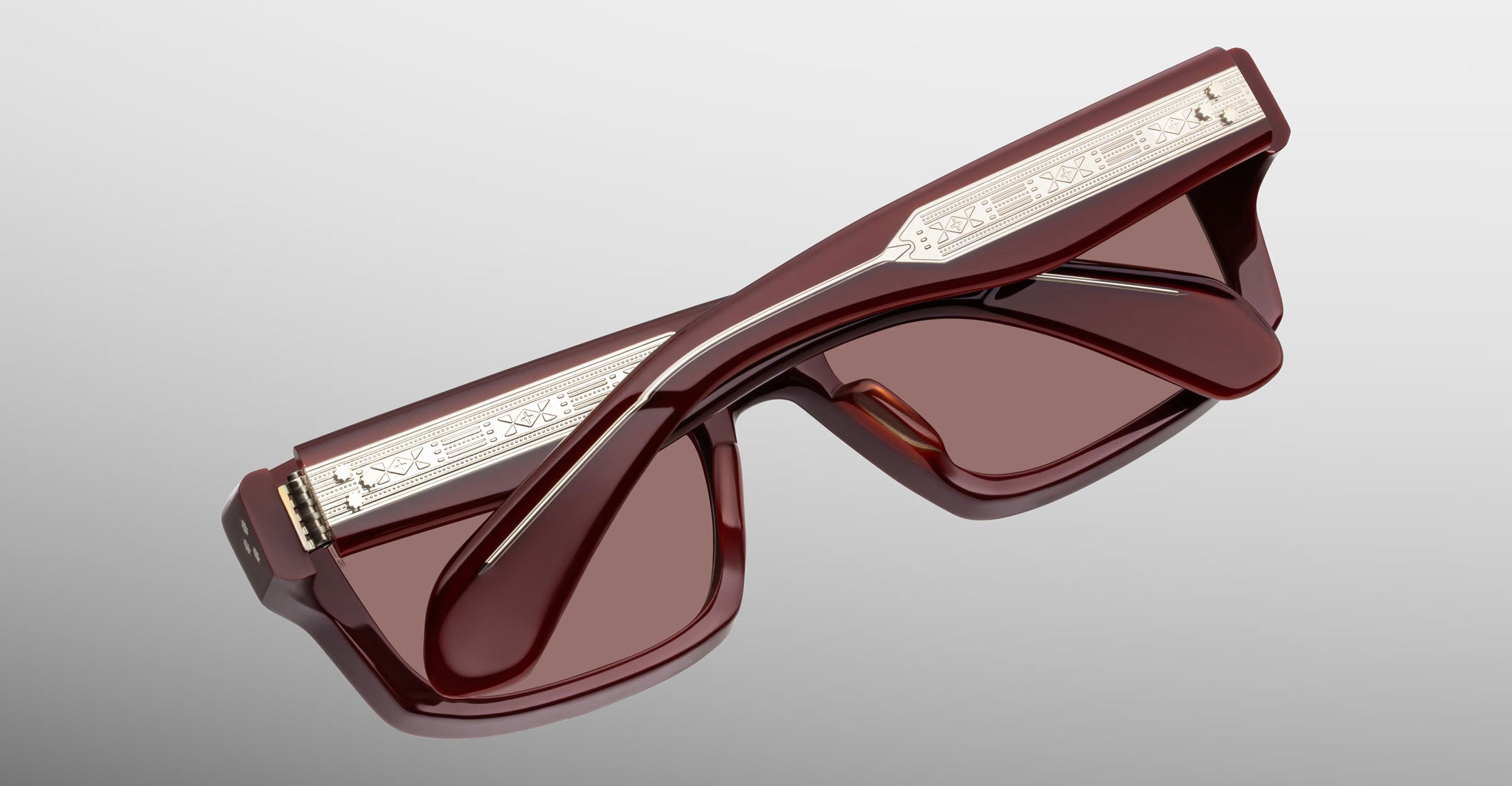Jacques Marie Mage Cleavon 57 brown sunglasses with silver detailing on the arms, front angle view.