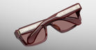 Jacques Marie Mage Cleavon 57 brown sunglasses with silver detailing on the arms, front angle view.