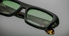 Jacques Marie Mage Cleavon sunglasses, dark green lenses, tortoiseshell arms, close-up front and side angle.