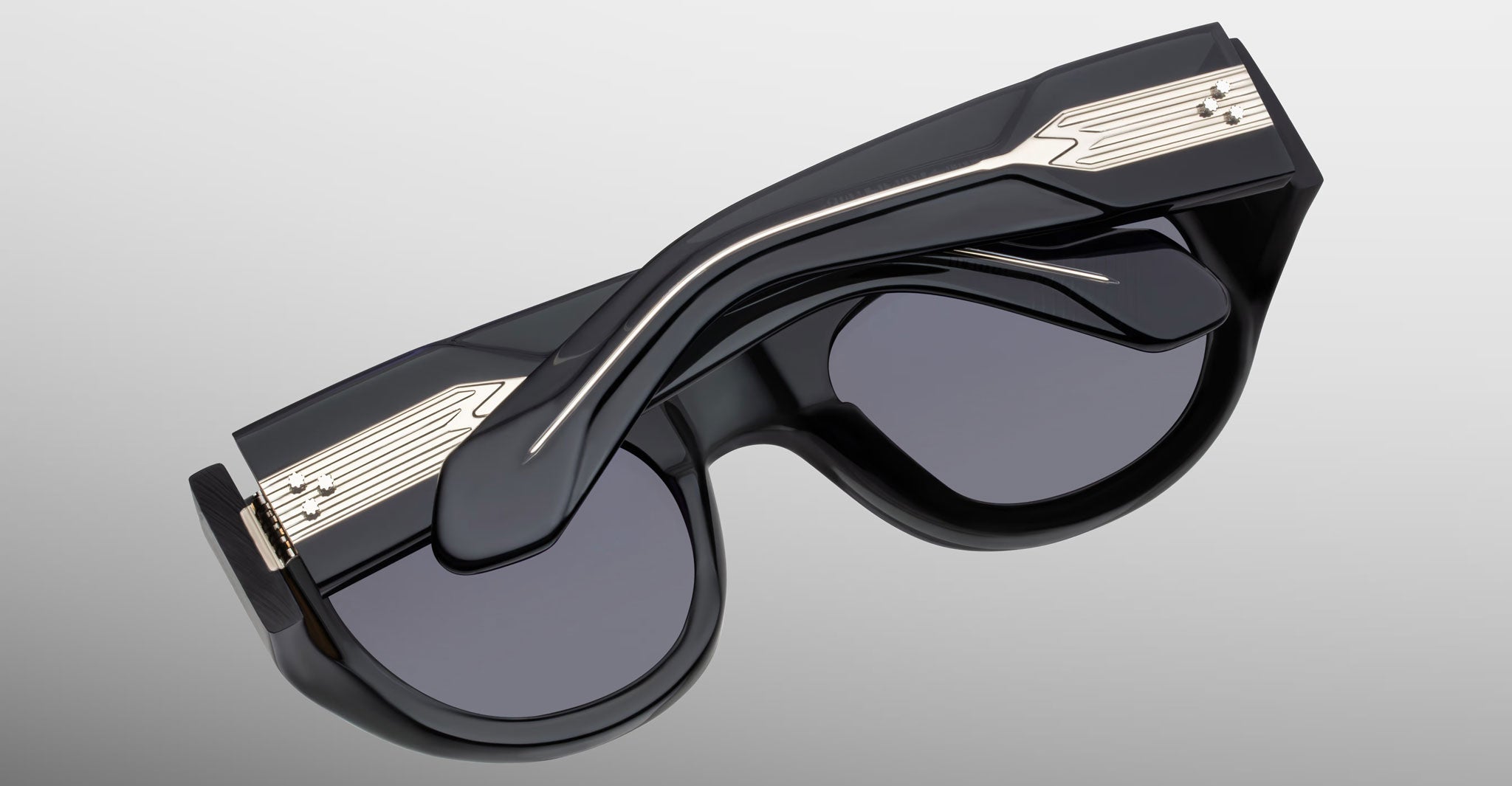 Back view of the Jacques Marie Mage Clyde 2.0 sunglass in Grisaille Black acetate wtih silver in the temples