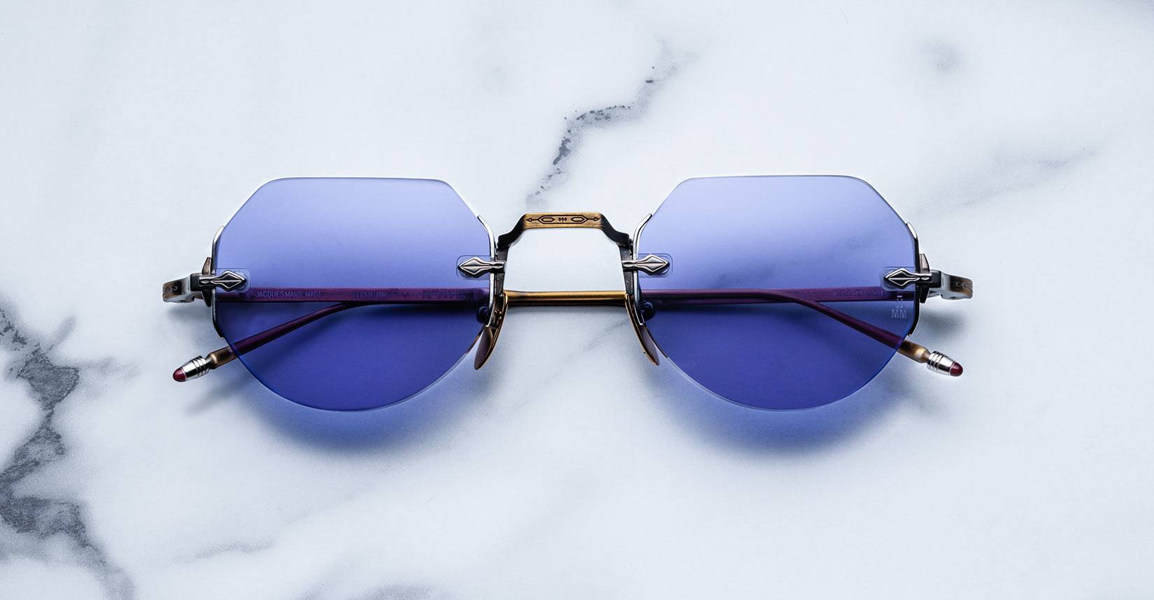 Jacques Marie Mage Cody style rimless sunglasses in Bronze colorway with purple lenses