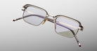 Jacques Marie Mage Comanche in Tempest rectangular silver metal eyeglasses with clear lenses, front view.
