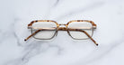 Jacques Marie Mage Comanche in Vintage Tortoise square tortoiseshell eyeglasses with metal accents, top-down view.