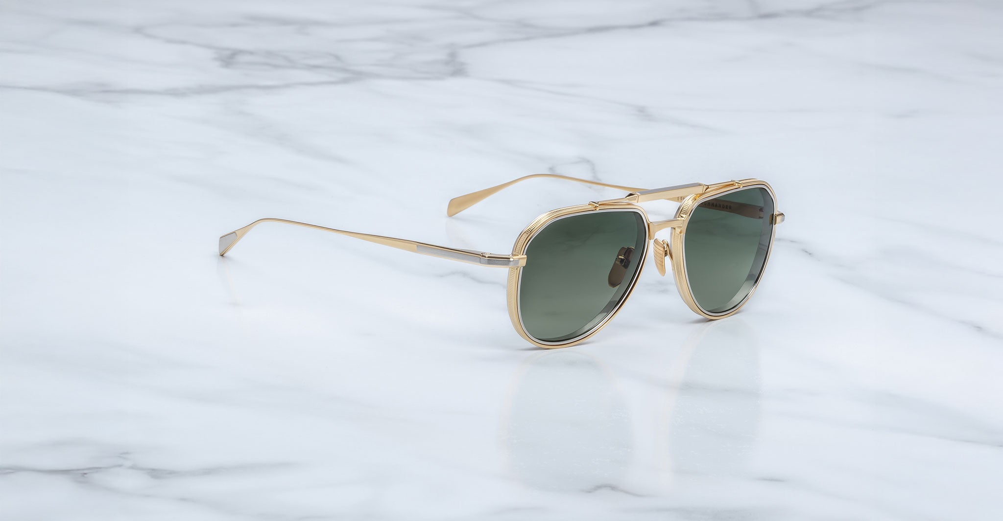 Jacques Marie Mage Commander in Musket — gold-tone aviator sunglasses with a double-bridge titanium frame, green lenses, and slim sculpted temples.