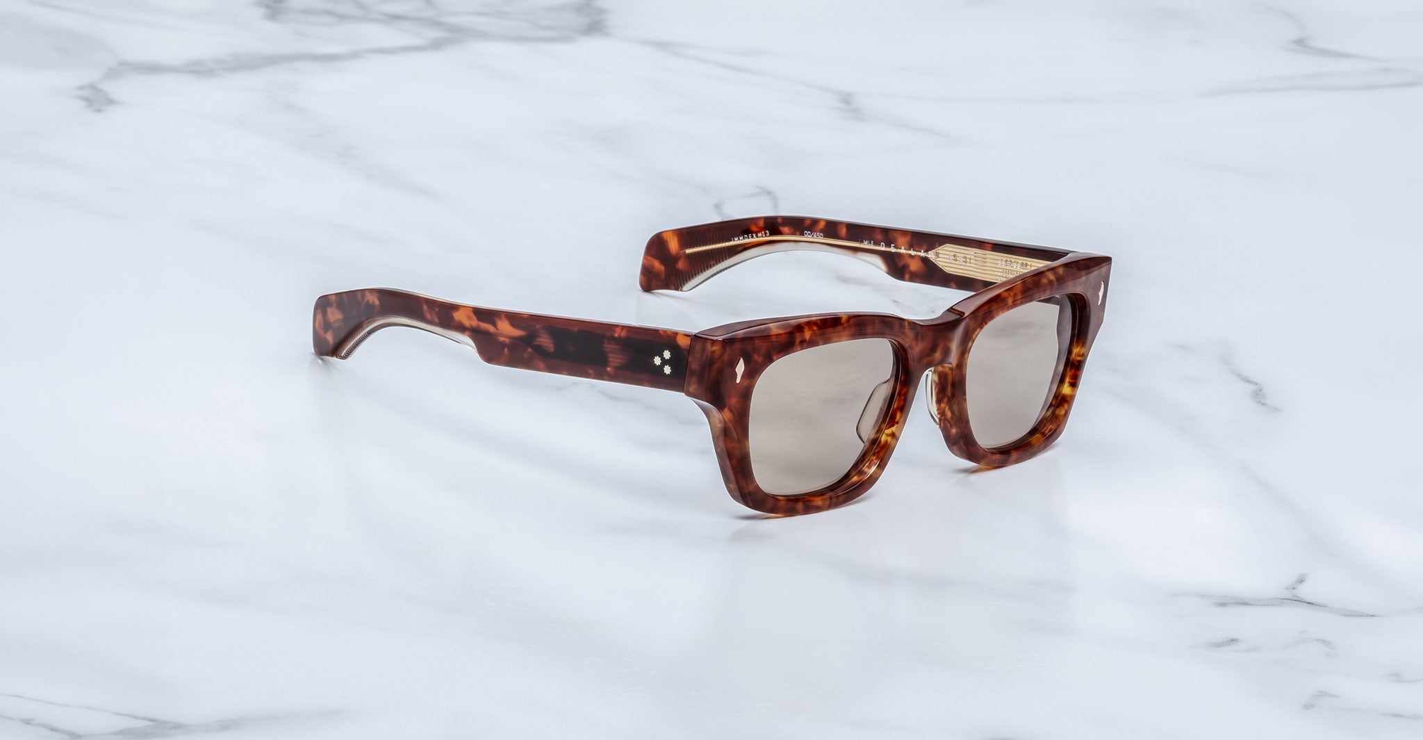 Jacques Marie Mage Dealan 53 tortoiseshell sunglasses with thick frames, shown from the front.