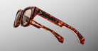 Jacques Marie Mage Dealan 53 sunglasses with square tortoiseshell frames, thick arms, and light brown lenses, front view.