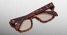 Jacques Marie Mage Dealan 53 tortoiseshell eyeglasses with thick frames, top-down view.