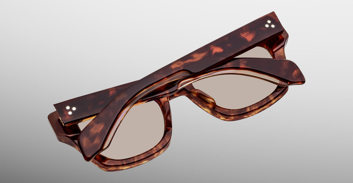 Jacques Marie Mage Dealan 53 tortoiseshell eyeglasses with thick frames, top-down view.