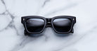 Jacques Marie Mage Dealan 53 black sunglasses with UV lenses, top view.