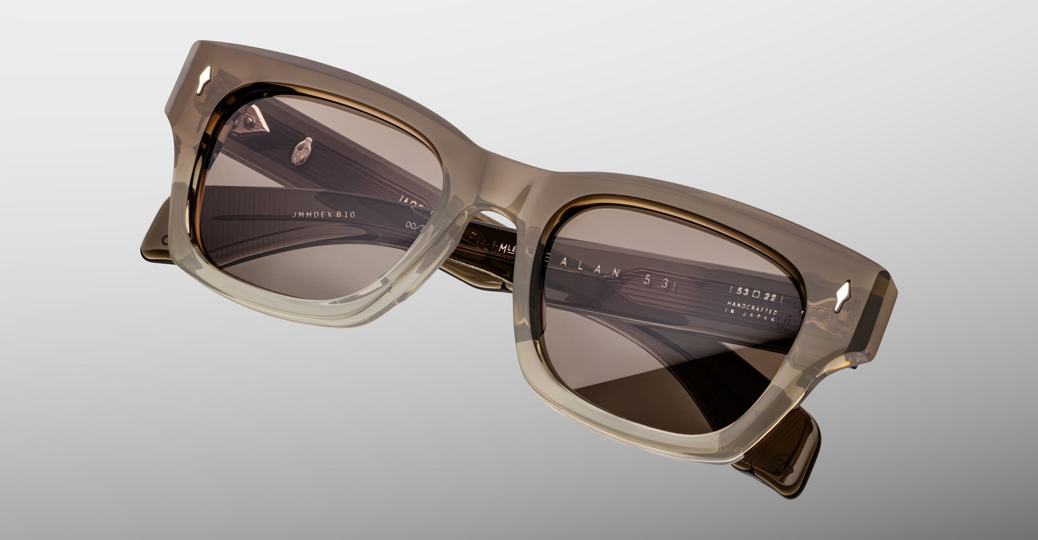 Jacques Marie Mage Dealan 53 sunglasses with square beige frames and dark lenses, shown from the front.