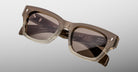 Jacques Marie Mage Dealan 53 sunglasses with square beige frames and dark lenses, shown from the front.
