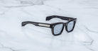 Jacques Marie Mage Dealan 53 black rectangular sunglasses with silver arms, shown from the front angle.