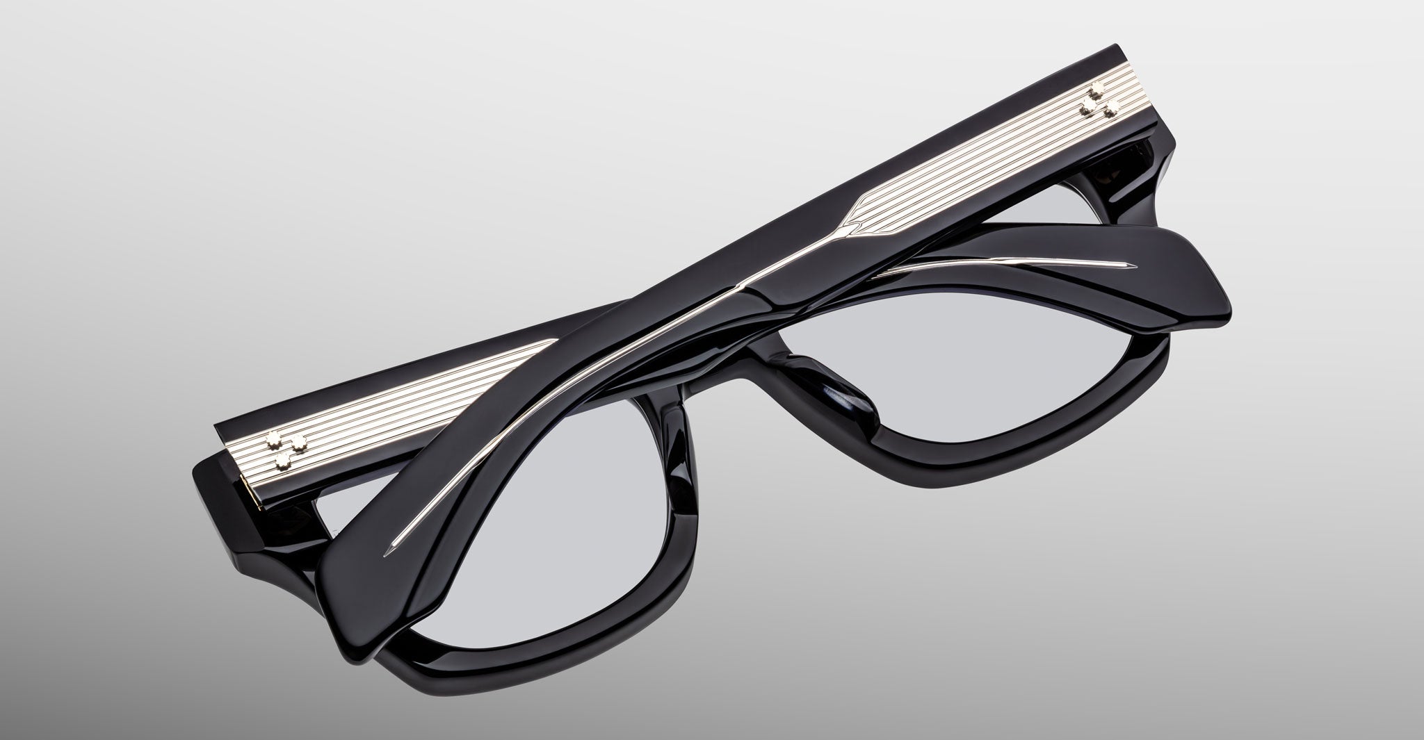 Jacques Marie Mage Dealan 53 black eyeglasses with silver temple accents, top view.
