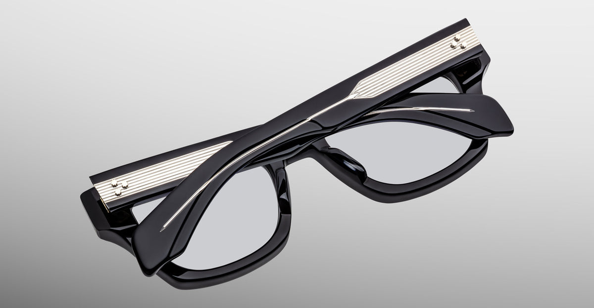 Jacques Marie Mage Dealan 53 black eyeglasses with silver temple accents, top view.
