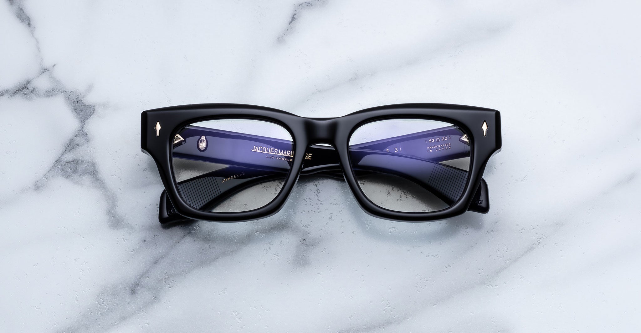 Jacques Marie Mage Dealan 53 eyeglasses with clear lenses, top view.