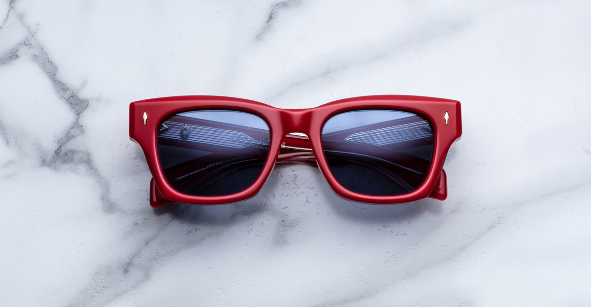 Jacques Marie Mage Dealan 53 red sunglasses with UV-protected dark lenses, top view.