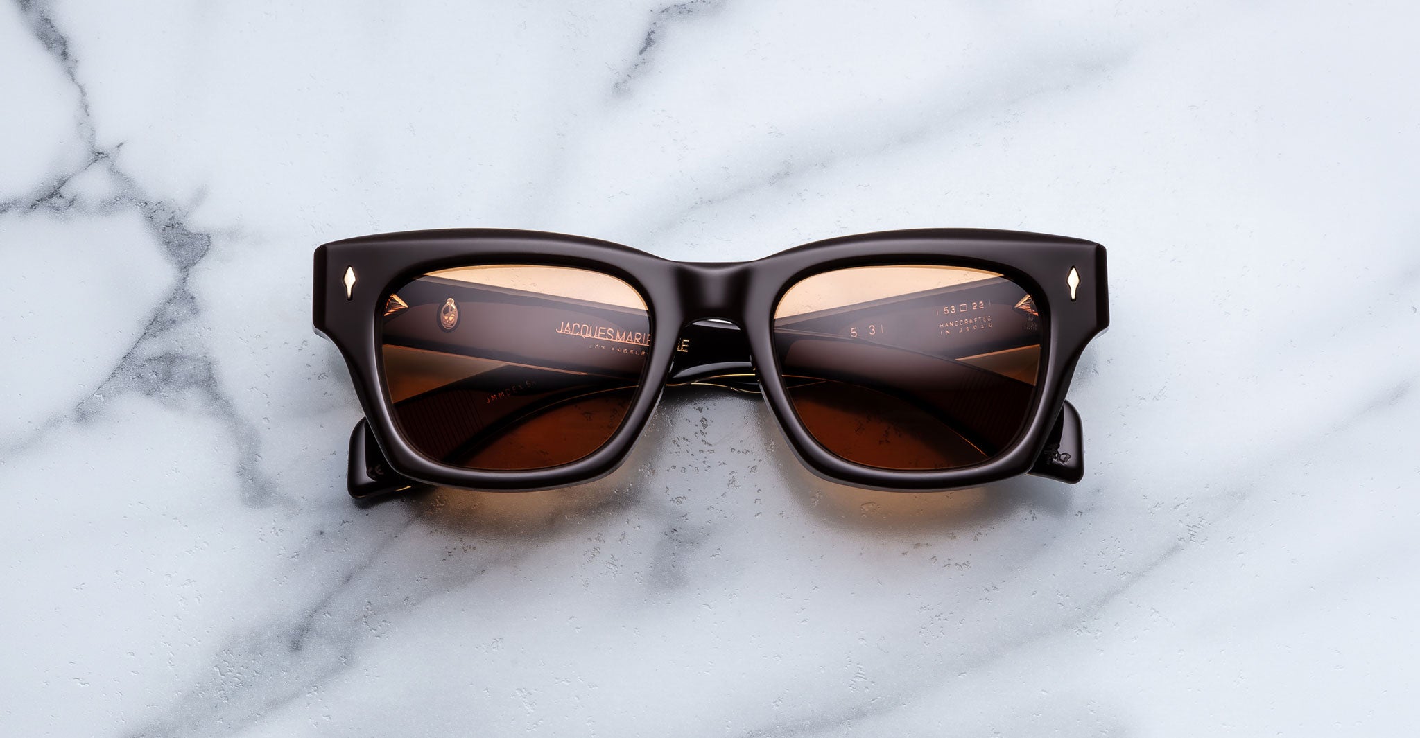 Jacques Marie Mage Dealan 53 black square sunglasses with brown lenses, top view.