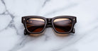 Jacques Marie Mage Dealan 53 black square sunglasses with brown lenses, top view.