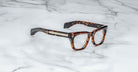 Jacques Marie Mage Dealan tortoiseshell eyeglasses with thick frames, front view.