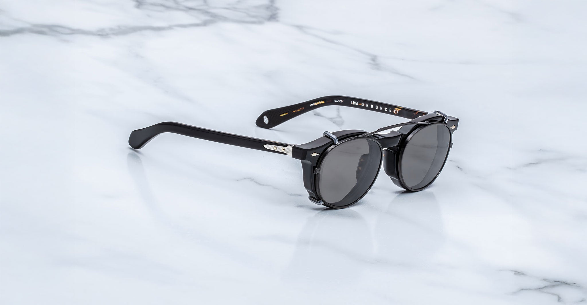 Jacques Marie Mage Demoncey Clip-On sunglasses with grey lenses, top view, showing front and clip-on attachment.