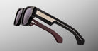 Jacques Marie Mage Dino in Bloodstone black acetate sunglass frame with grey lenses, gold arrowhead pins, and sculptural wide temples, side view showing engraved wirecore and temple detail