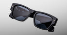Jacques Marie Mage Dino in Lacquer dark blue acetate sunglass frame with lacquer dark blue lenses, gold arrowhead pins, and sculptural wide temples, angled top view showing lens and bridge detail