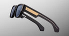 Jacques Marie Mage Dino in Lacquer dark blue acetate sunglass frame with lacquer dark blue lenses, gold arrowhead pins, and sculptural wide temples, side view showing engraved wirecore and temple detail