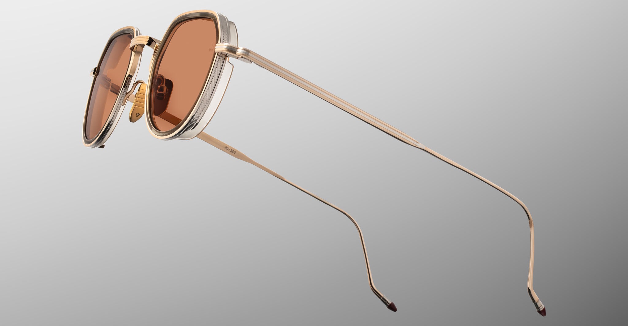 Jacques Marie Mage Dixon gold metal sunglasses with brown lenses, double bridge, and slim temples, front view.