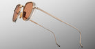 Jacques Marie Mage Dixon gold metal sunglasses with brown lenses, double bridge, and slim temples, front view.