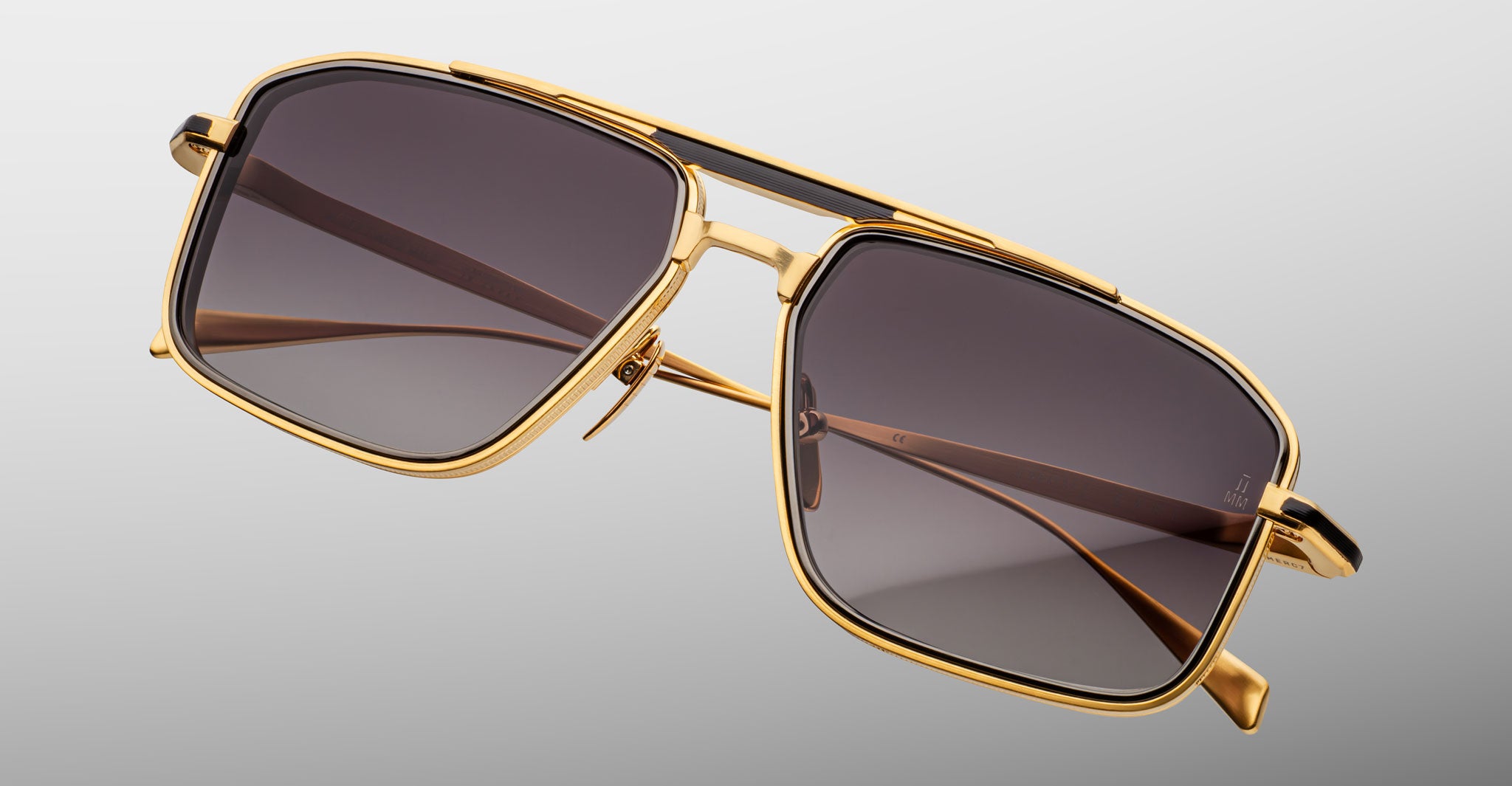 Jacques Marie Mage Earl gold aviator sunglasses with dark UV lenses, front view.