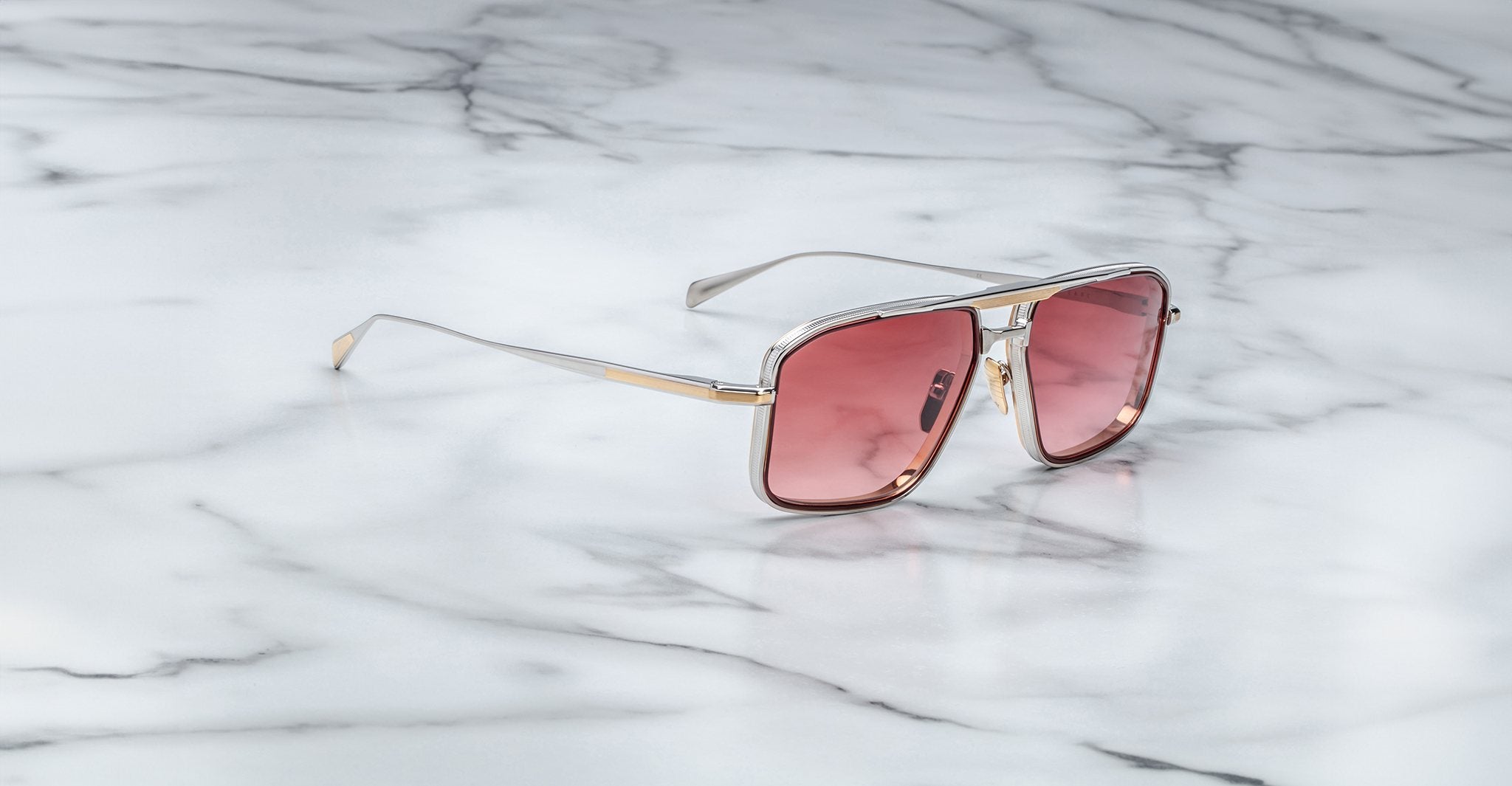 Jacques Marie Mage Earl sunglasses with square frames and pink lenses, front view.