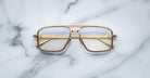 Jacques Marie Mage Earl gold aviator eyeglasses with clear lenses, top view showing full frame and temples.