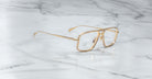Jacques Marie Mage Earl gold aviator eyeglasses with clear lenses, front-facing view.