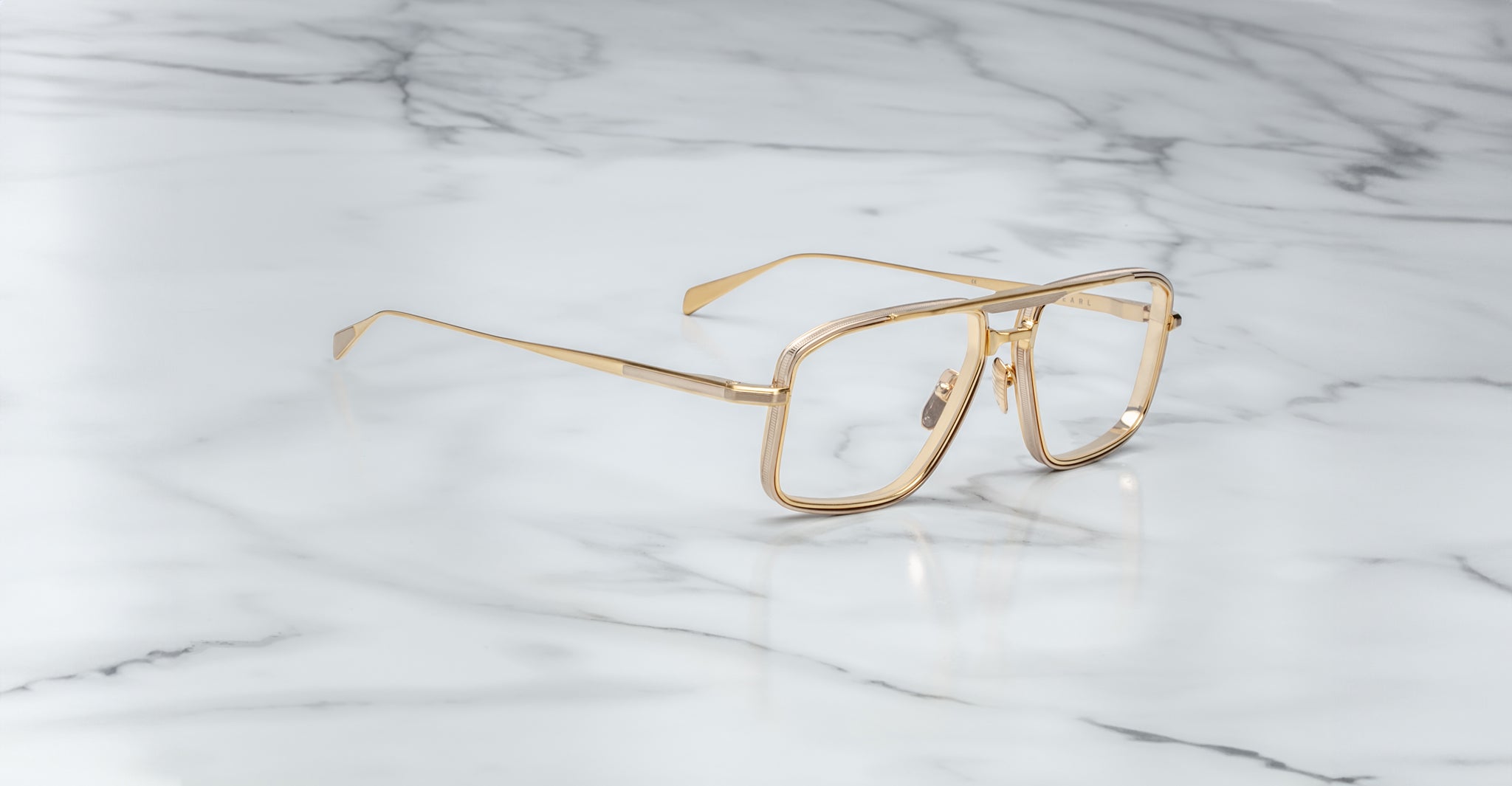 Jacques Marie Mage Earl gold aviator eyeglasses with clear lenses, front-facing view.